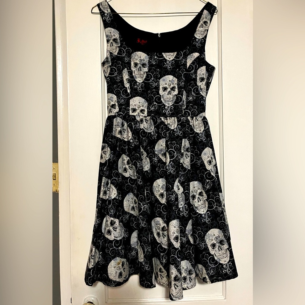 Foller,, black with white iridescent skulls, dress. Size S